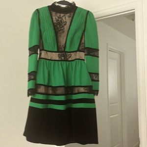 Green and Black short dress with long sleeve dress.